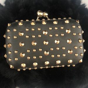 Black studded clutch